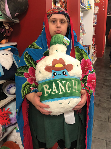 Holding staffed animal in the store