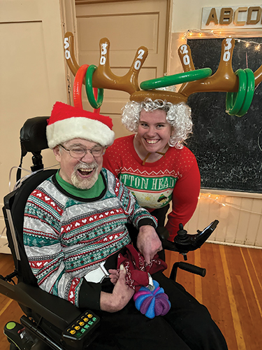 With staff member at Christmas party