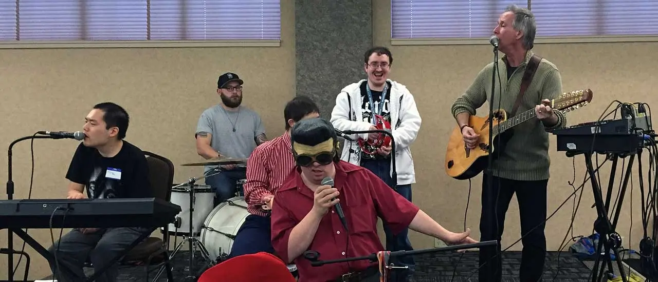 The band Out of Ashes playing on stage