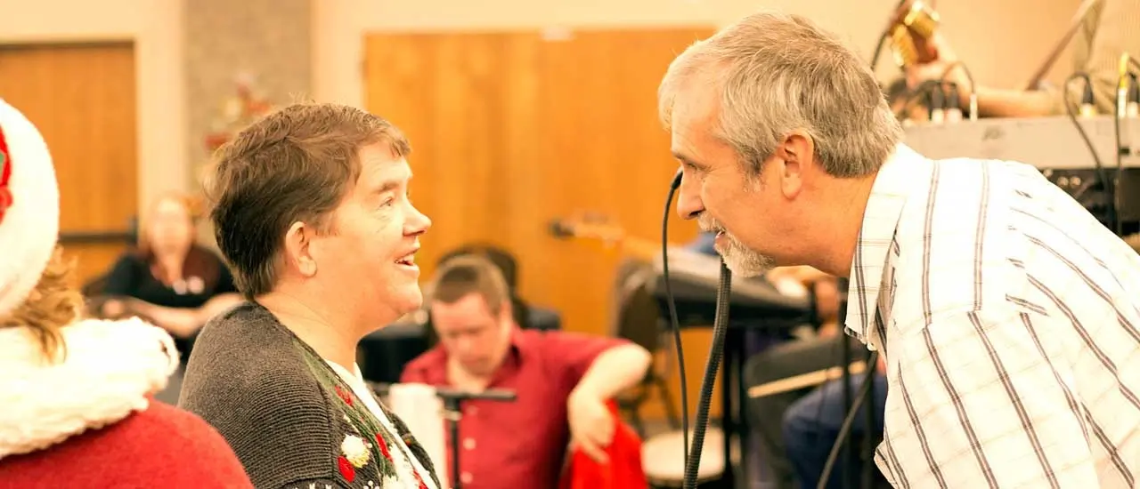 Former Executive Director, George Beanblossom and one of the clients.