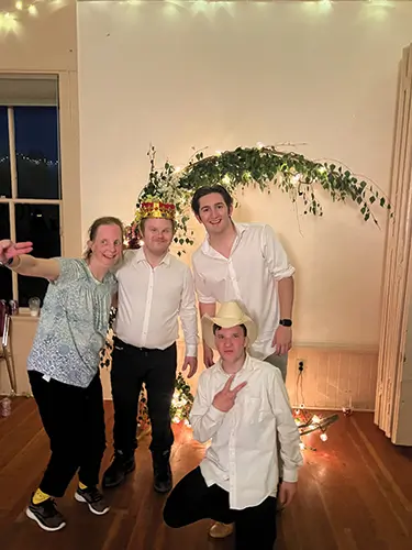 With friend and staff members